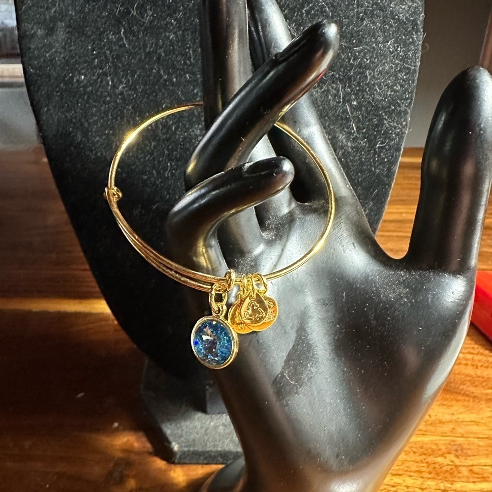 Alex and Ani Gold Bracelet with Sparkling Blue Charm